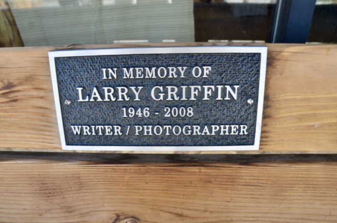 Bronze plaque reading: In Memory of Larry Griffin, 1946–2008, Writer / Photographer